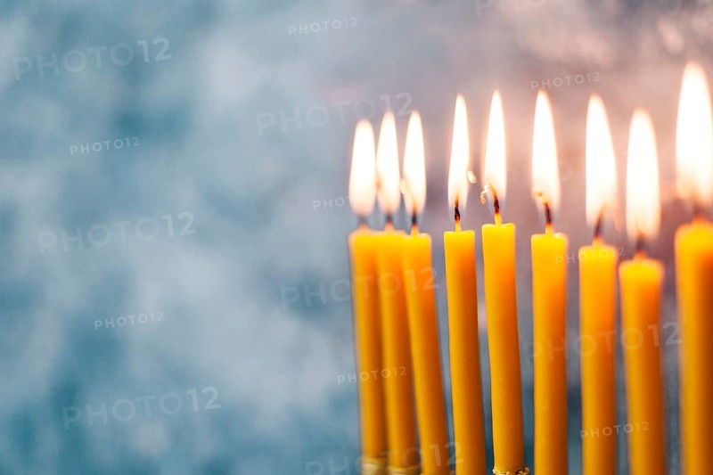 Close up holy candlesticks burning