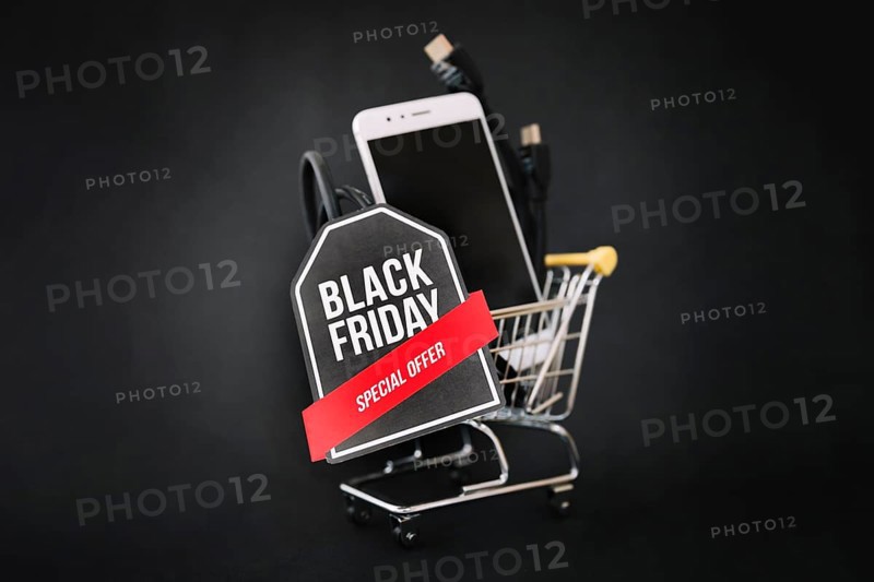 Black friday decoration with smartphone cart label