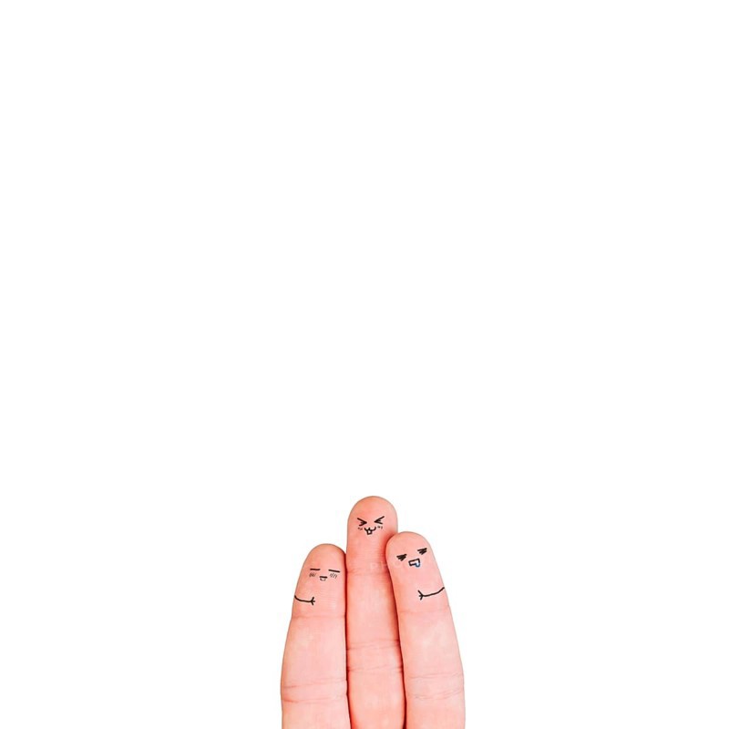 Three fingers with faces white