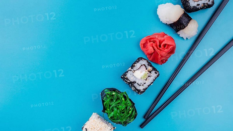 Delicious sushi rolls with copy space