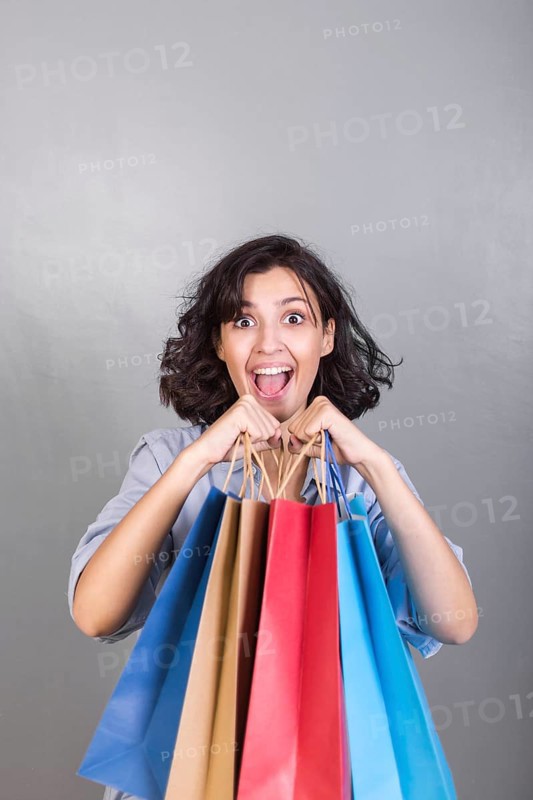 Happy woman with shopping bags