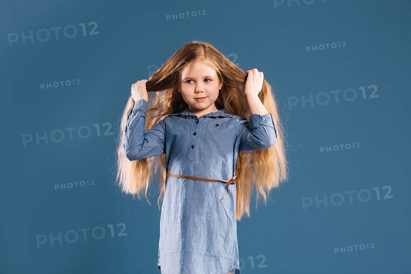 Cute girl touching hair