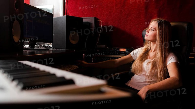 Close up keyboard blurred woman studio