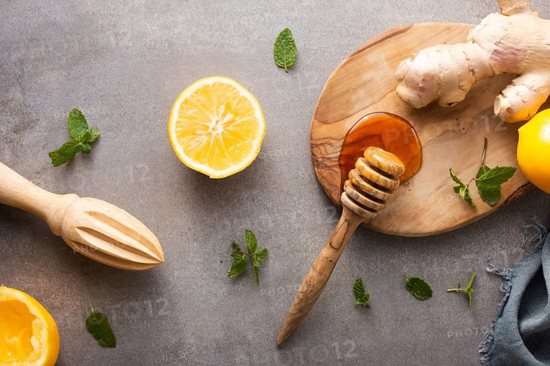 Top view honey with ginger lemon