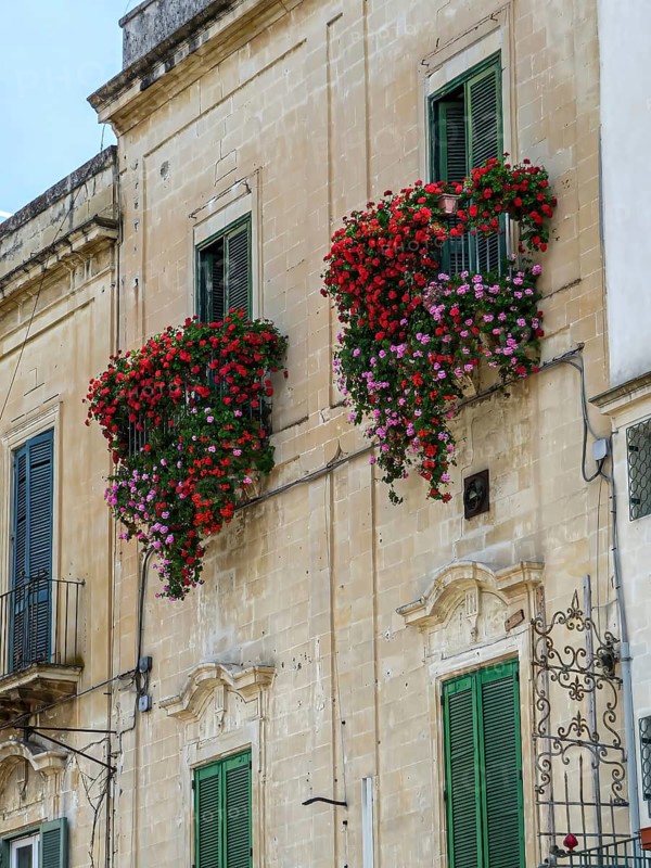 Italian house with balcony and flower boxes