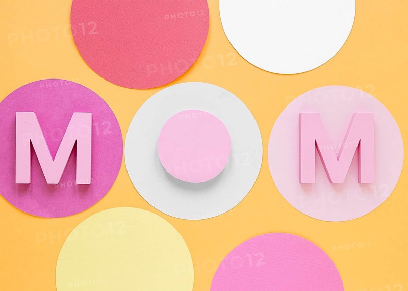 Top view mom word orange background