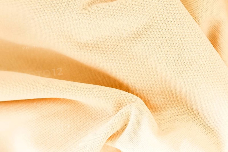 Close up texture salmon fabric suit