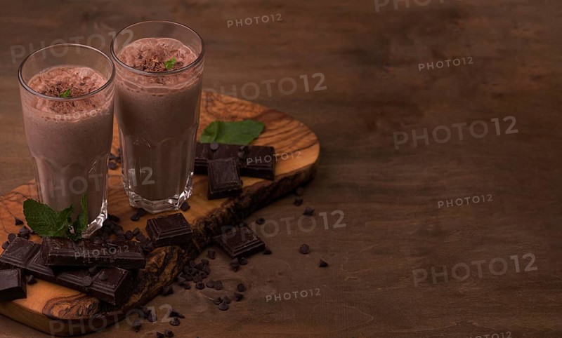 High angle milkshake glasses with copy space chocolate