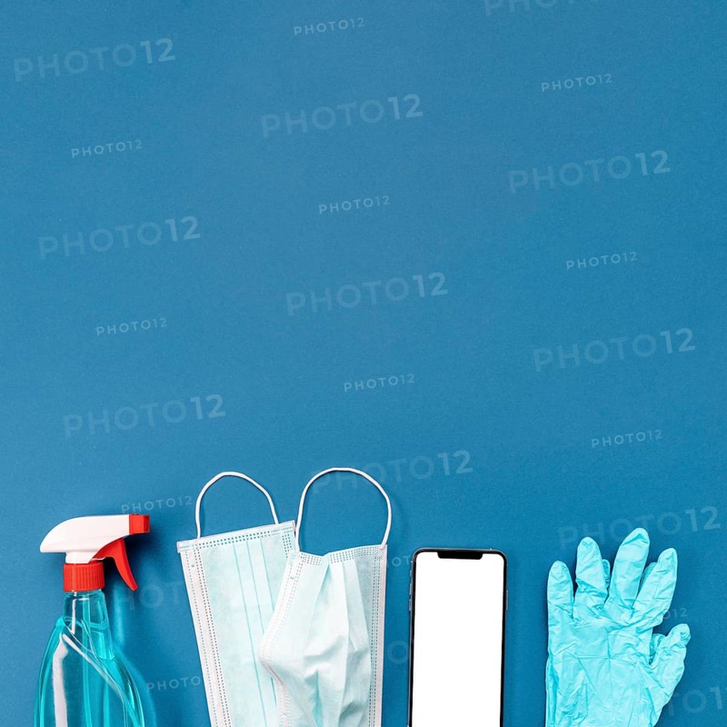 Top view medical mask gloves with blank phone