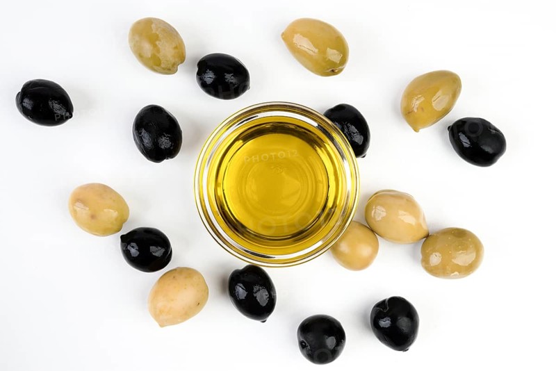 Top view organic olives with olive oil