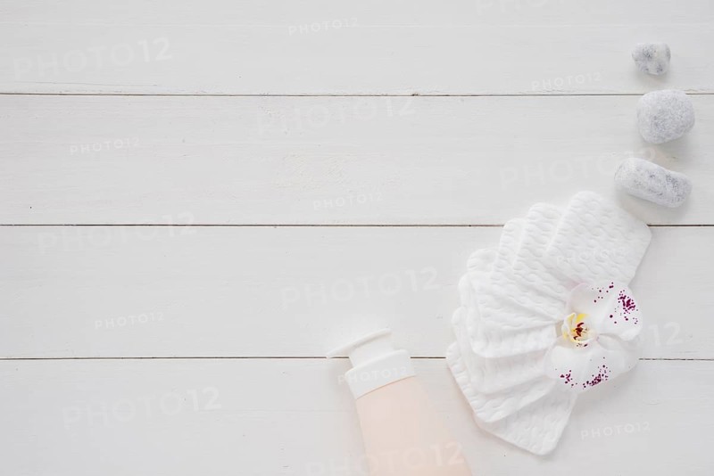 Lay out body care items white table