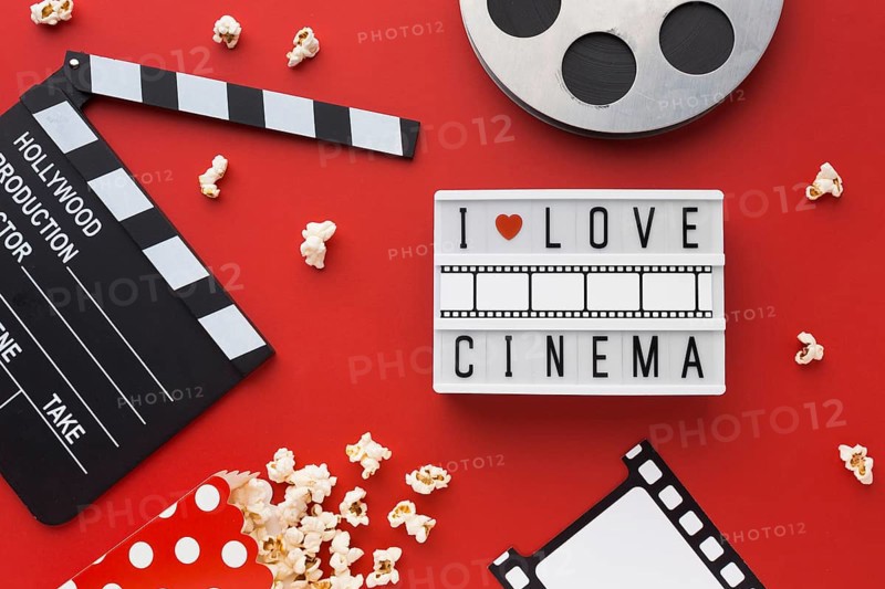 Flat lay cinema elements red background