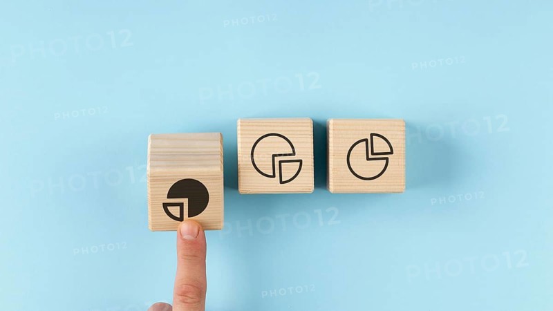 Pie charts wooden cubes arrangement