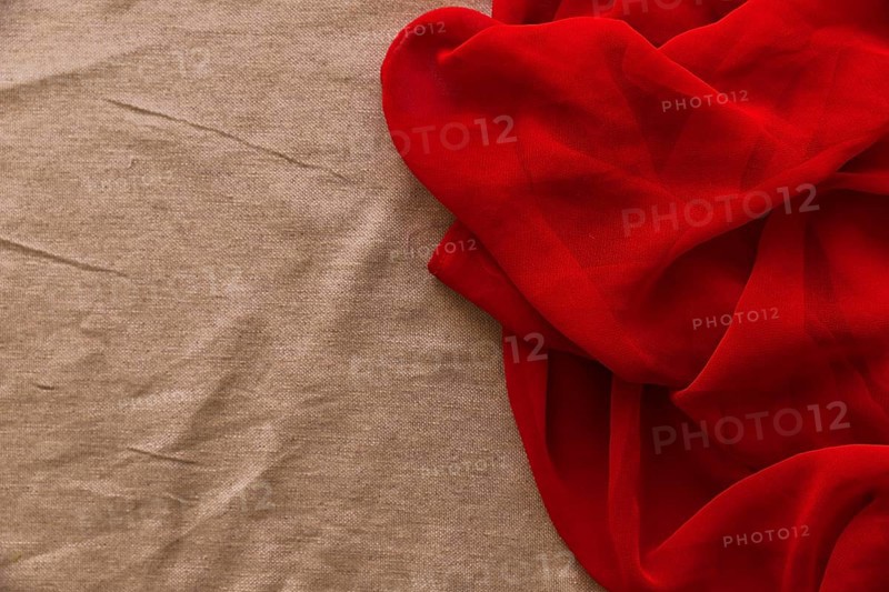 Smooth red textile brown fabric background