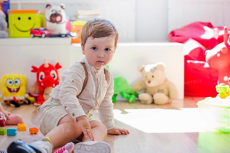 Boy sitting playroom