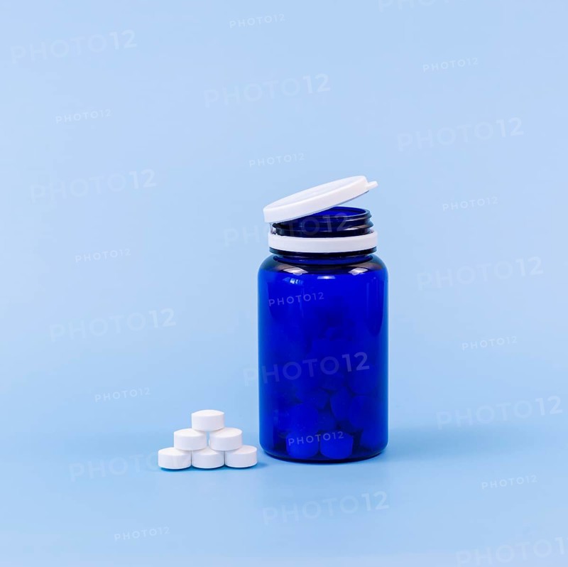 High angle pills plastic container with copy space