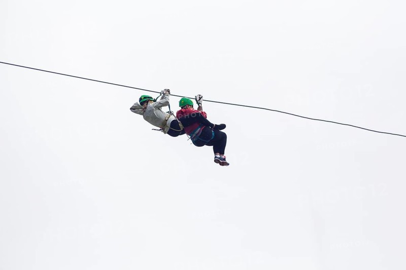 Two hiker zip line adventure against sky costa rica