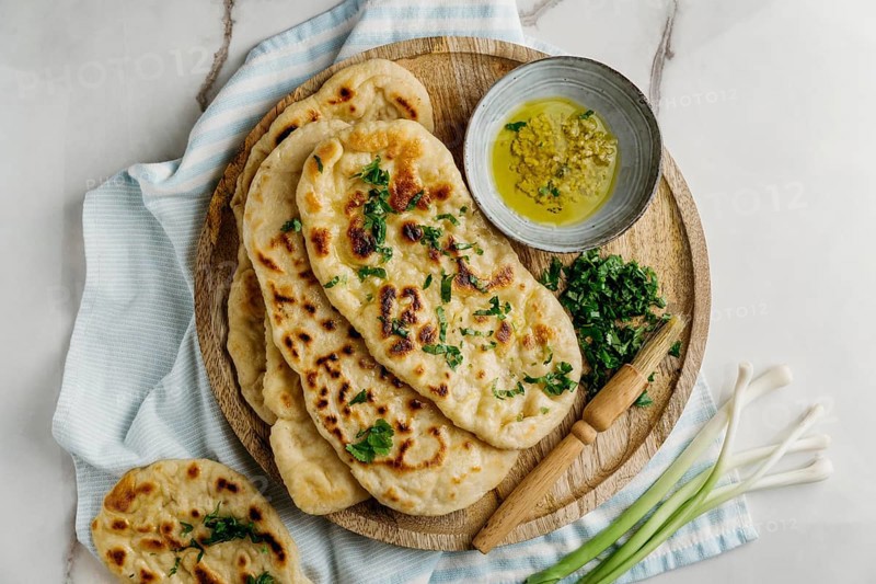 Pakistani food wooden board flat lay
