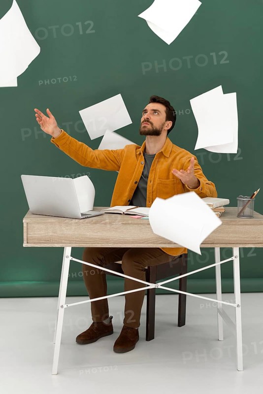 Stressed man working laptop