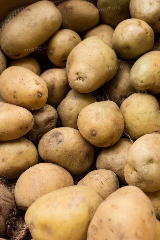 Top view raw potatoes arrangement
