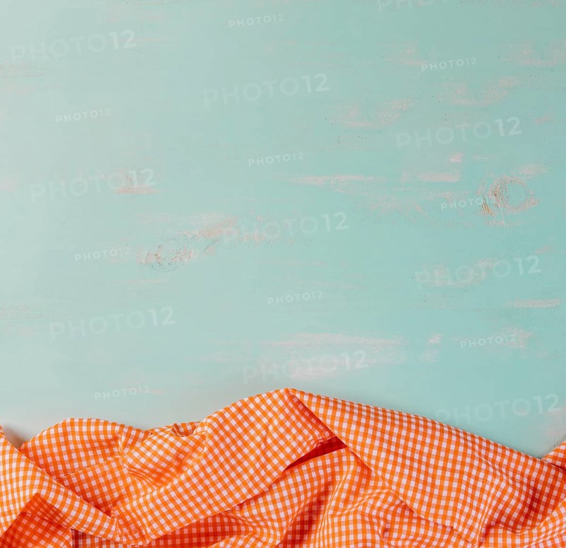 Checkered tablecloth blue background