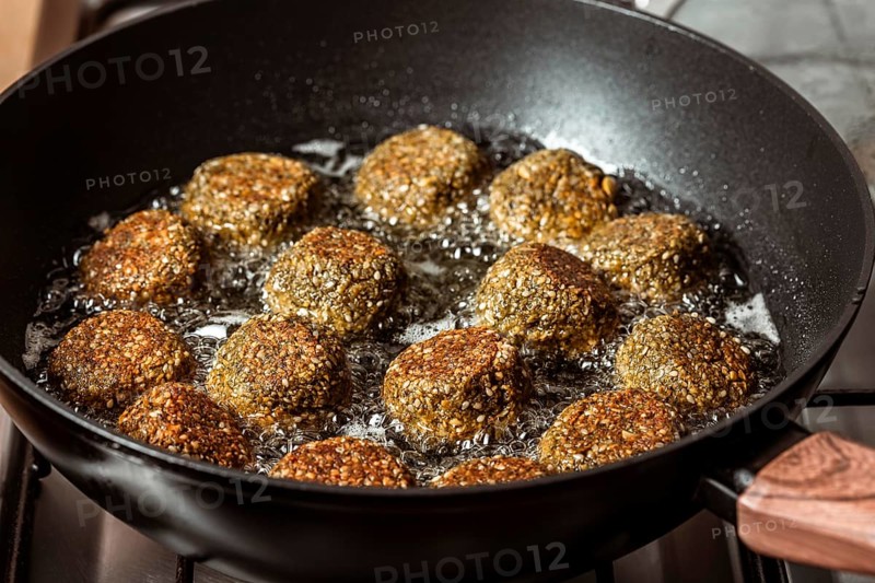 Delicious falafel frying pan high angle