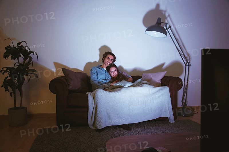 Couple watching movie together