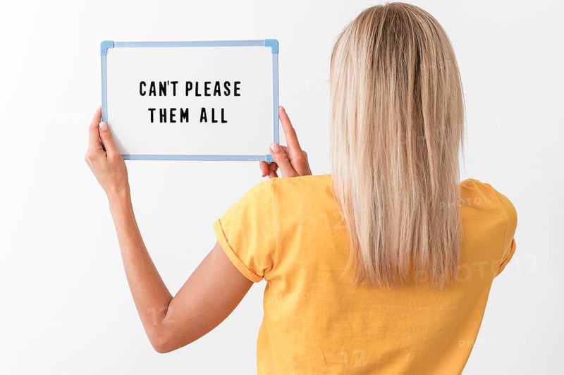 Medium shot woman holding board