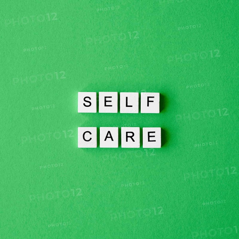 Flat lay letter cubes green background