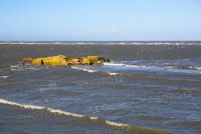 Remains of a World War II bunker on the island of Minsener Oog