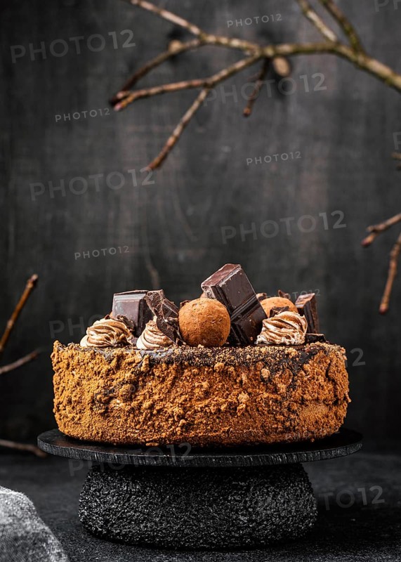 Front view round chocolate cake stand