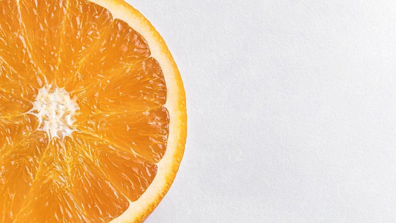 Flat lay orange slices with copy space