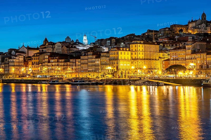 View over the river Douro to the old town of Porto at dusk