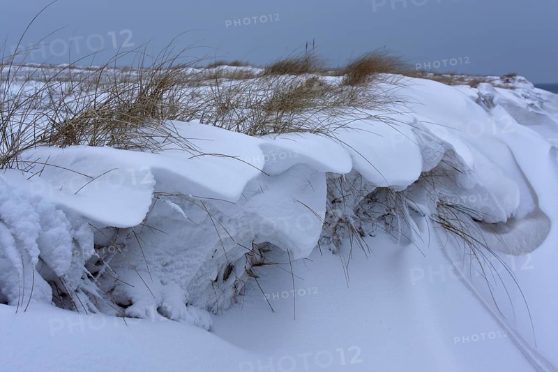 Snow-covered dunes on the island of Minsener Oog