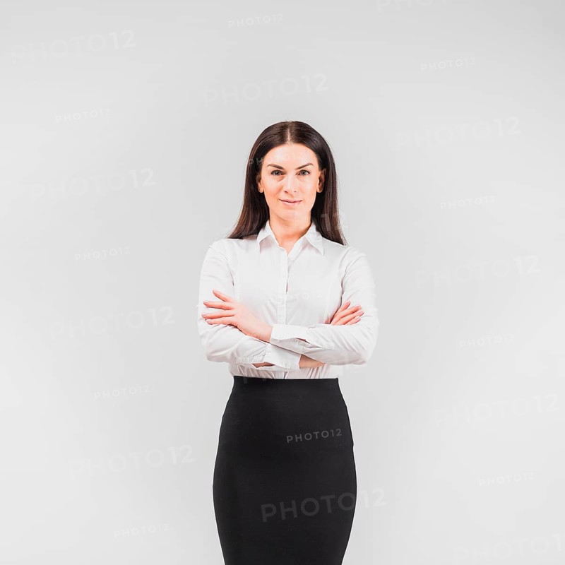 Business woman standing with crossed arms
