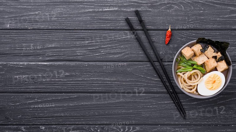Top view ramen healthy soup with egg chopsticks