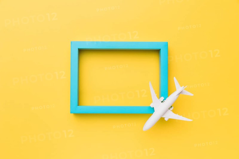 Composition small airplane blue frame