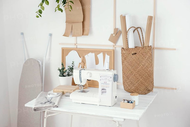 Front view tailoring studio with sewing machine table