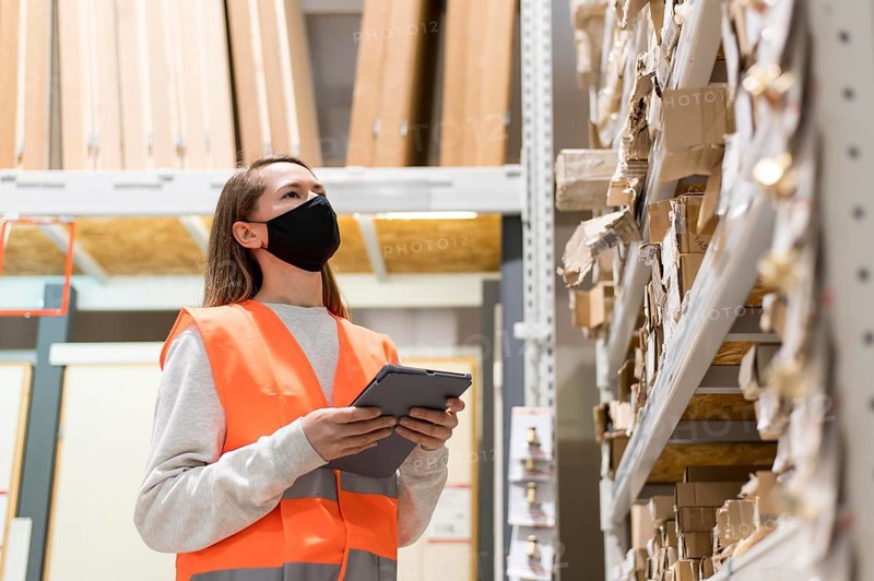 Medium shot woman wearing mask job