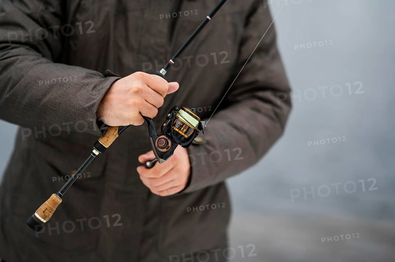 Man using fishing rod