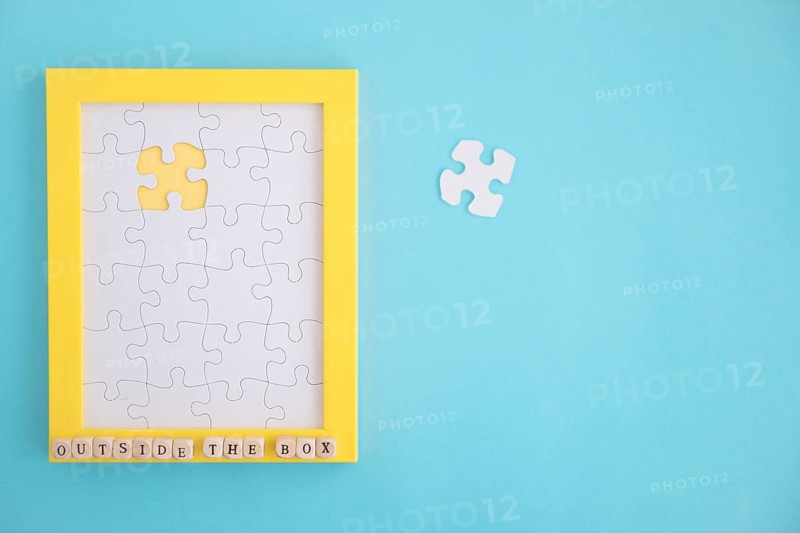 Missing white jigsaw puzzle frame blue background