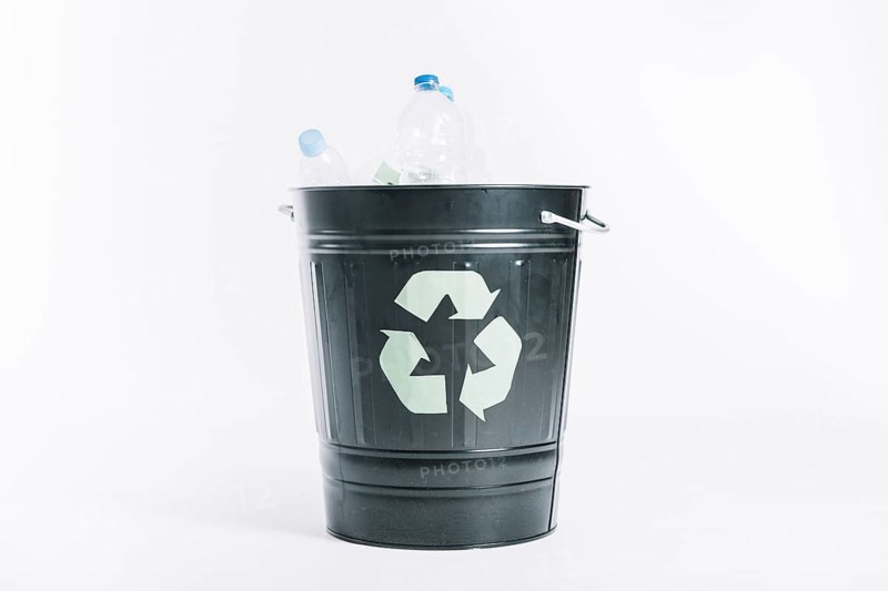 Recycle bucket with plastic bottles white background