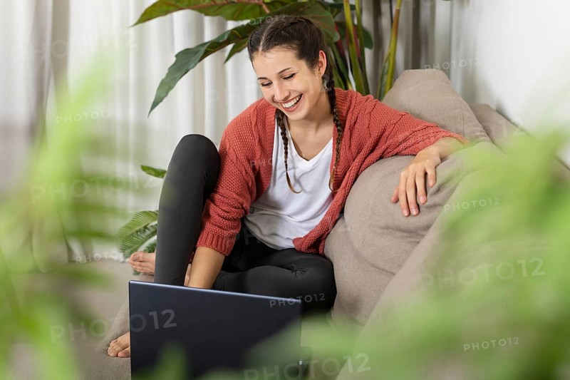 Woman with laptop home