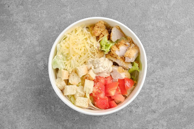 Top view of salad with chicken meat