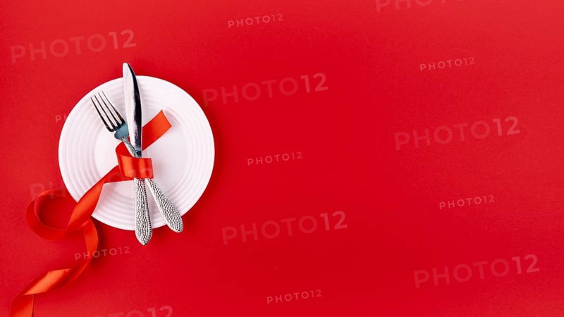 Top view cutlery plate with ribbon copy space