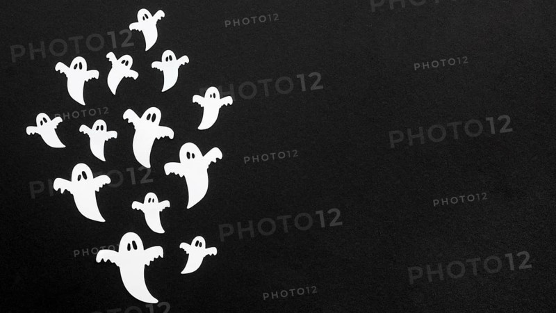 Top view creepy halloween ghosts with copy space