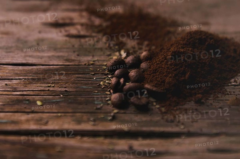 Coffee beans near ground coffee