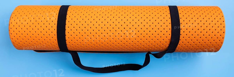 Top view yoga mat blue background
