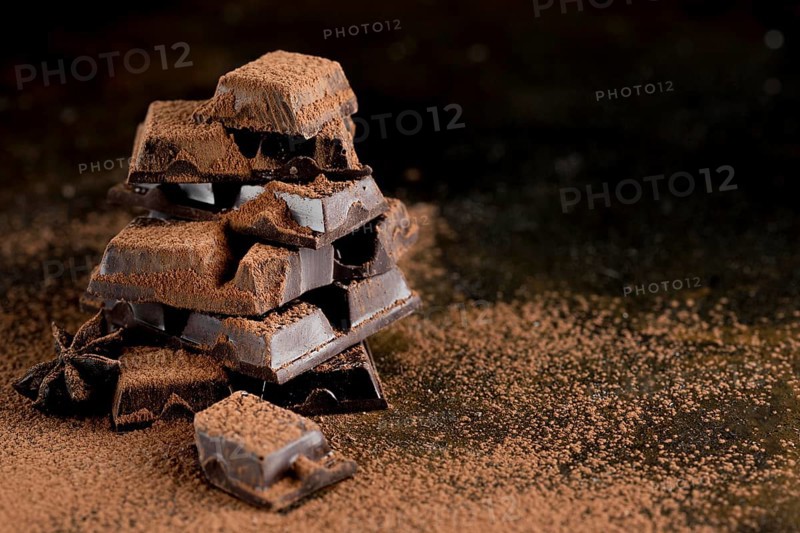 Front view chocolate with cocoa powder