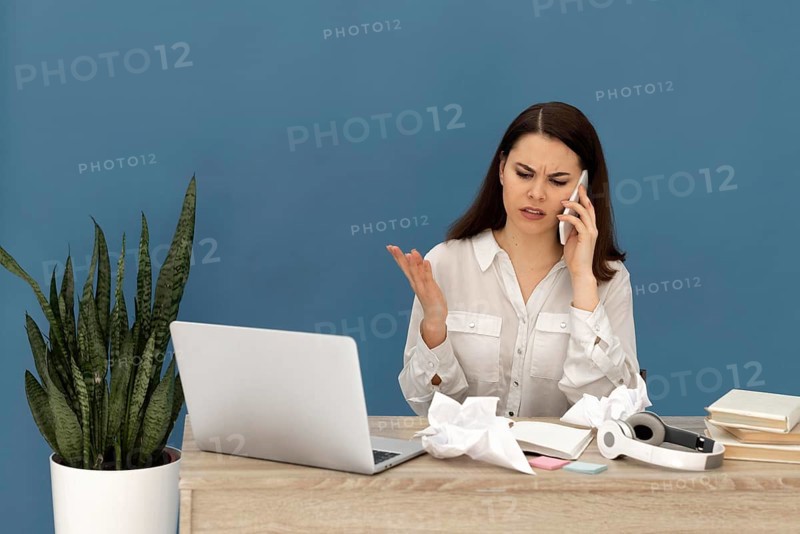Stressed woman working laptop